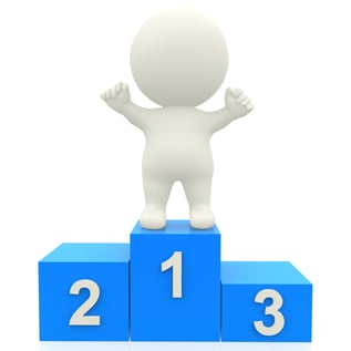 3d person in a podium winning first place - isolated over white